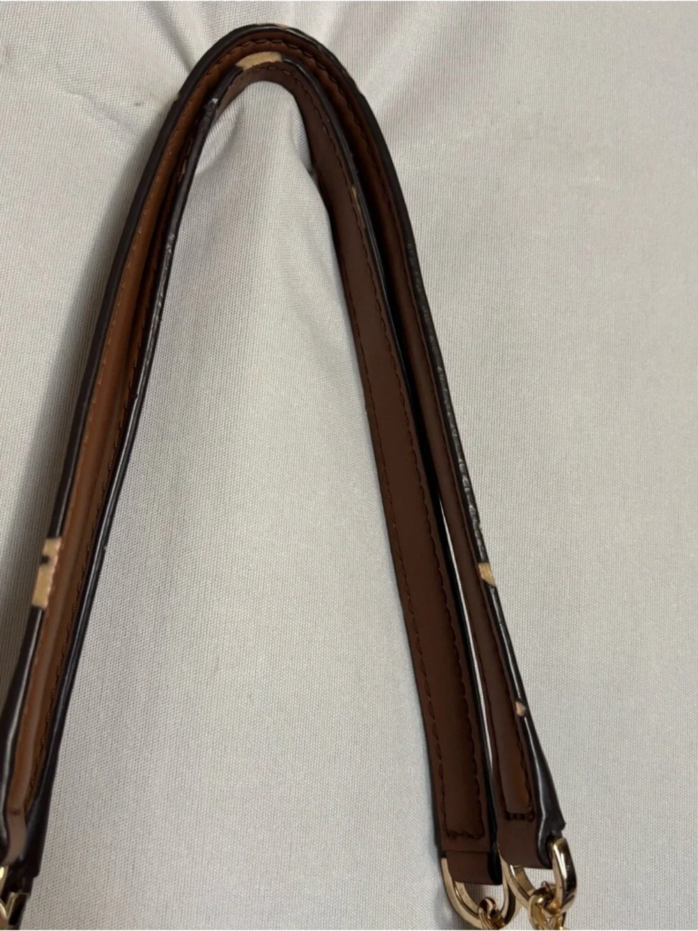 Michael Kors Cognac Pebbled Leather Tote with Gold Chain Straps zipper closure